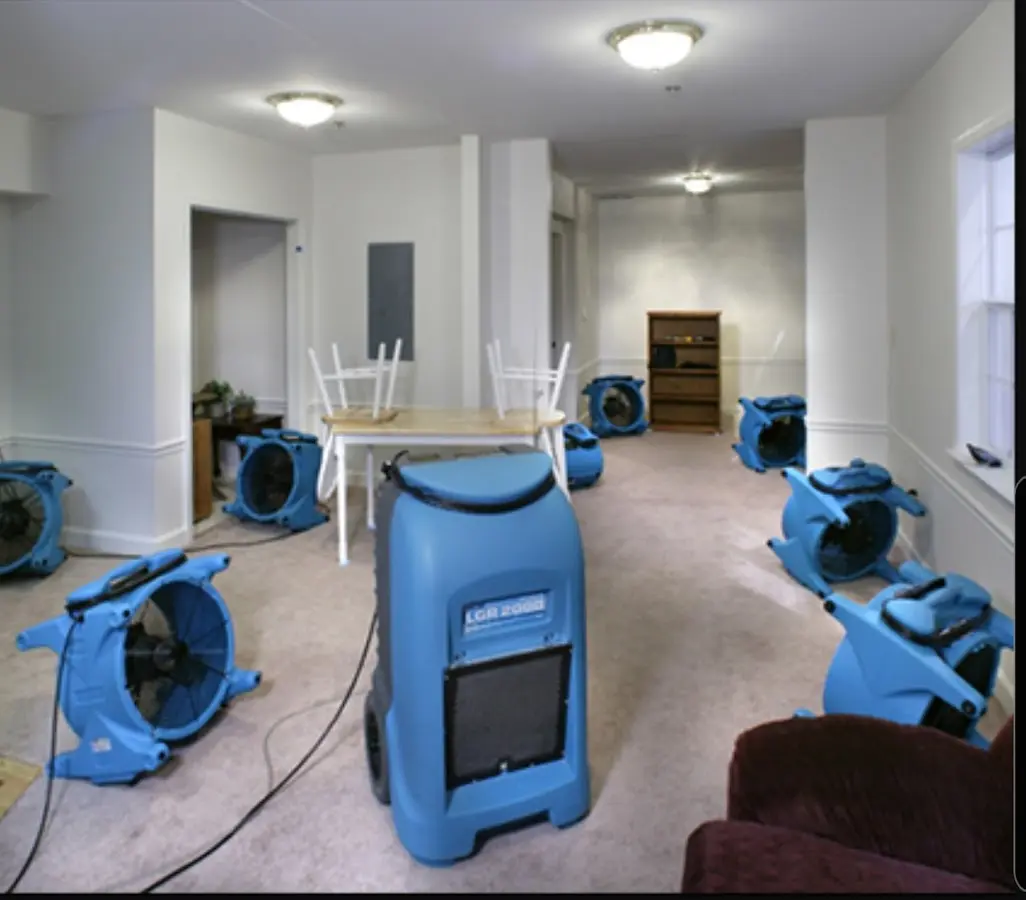 Air movers and dehumidifier setup for Water Damage Restoration in Kaysville